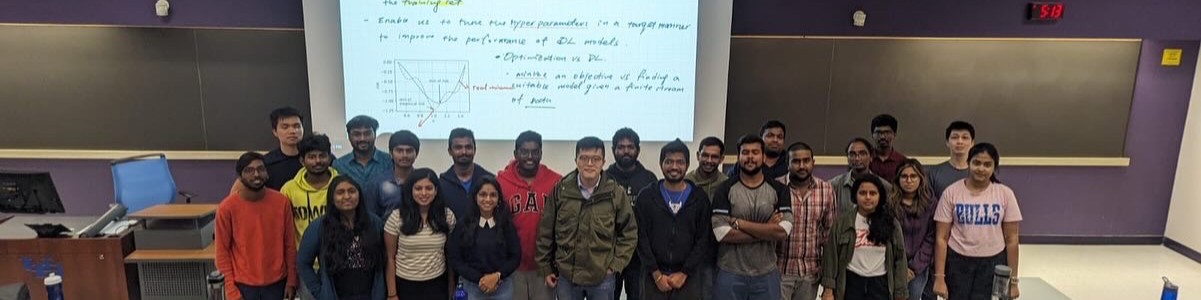 Jue Guo with a graduate class at the University at Buffalo