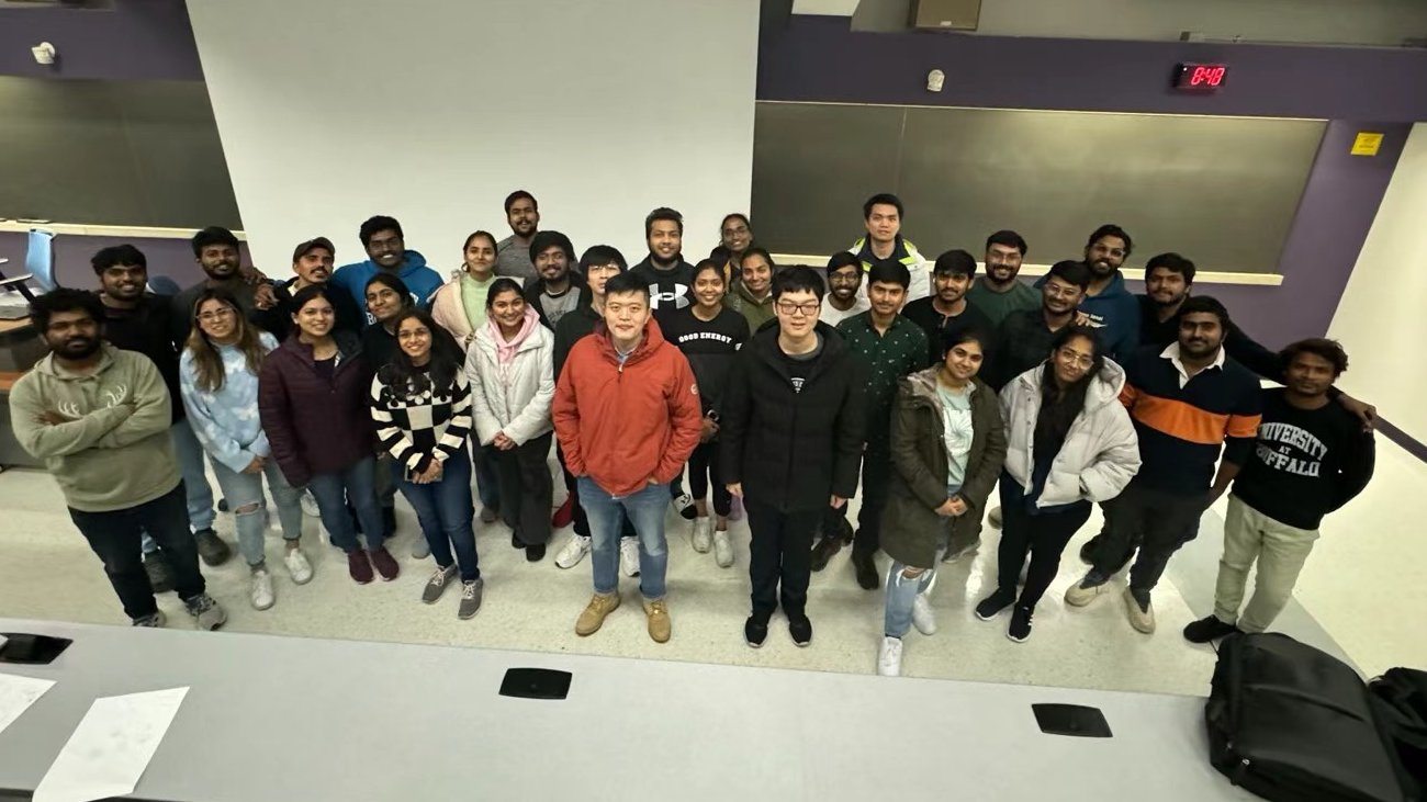 Jue Guo with a class of graduate students at the University at Buffalo